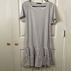 Boohoo black and white stripped dress. Size 14. Ruffled skirt.
